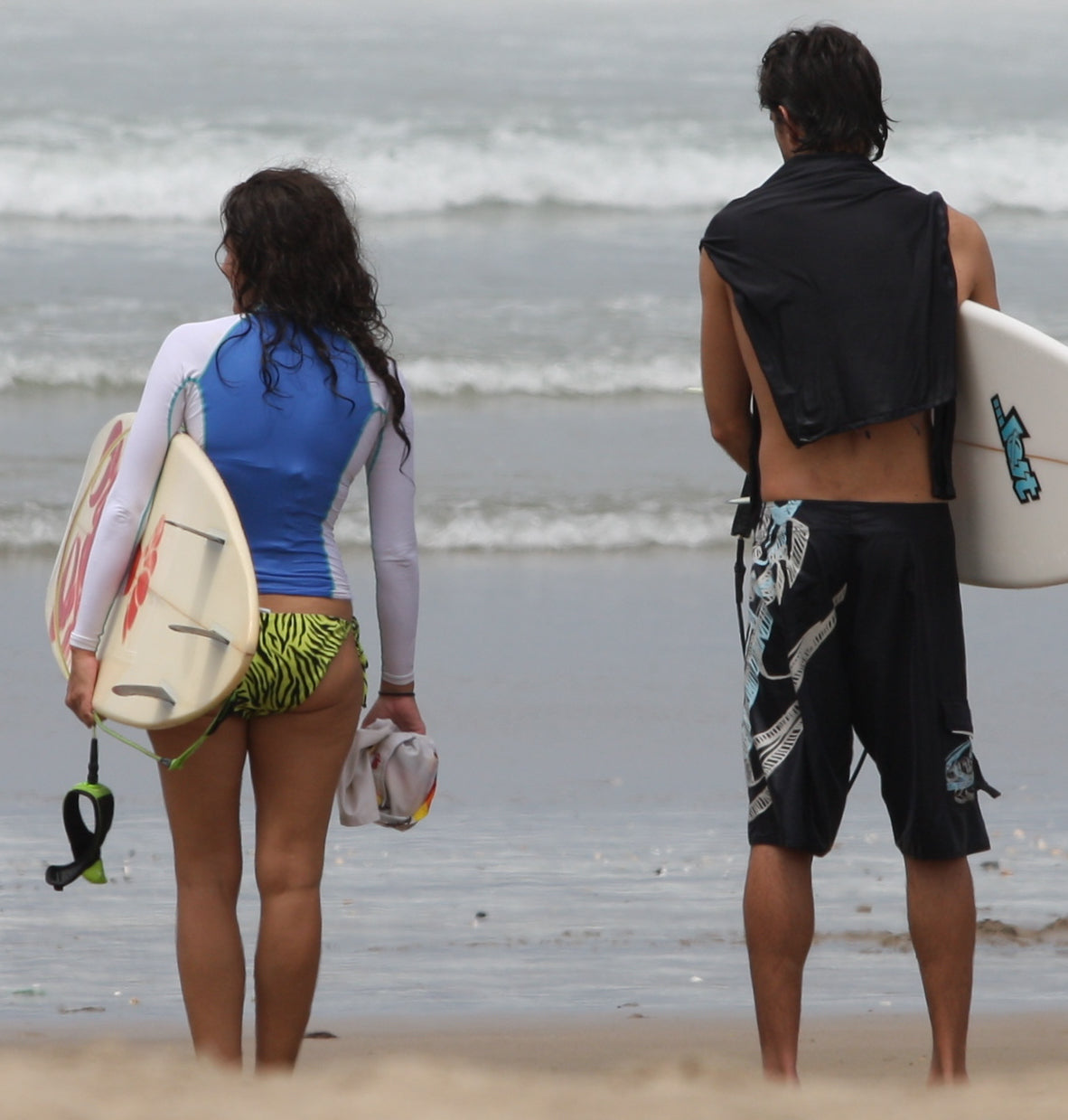 Surfers in rash guards