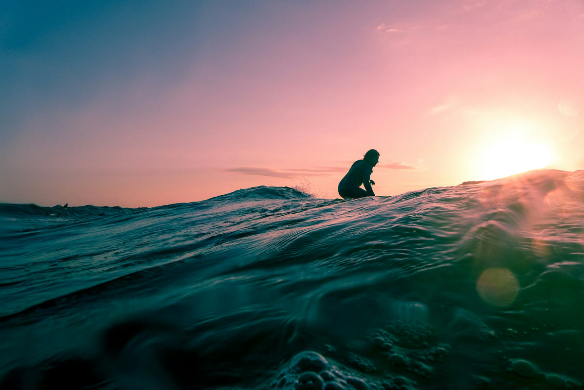 Surfer at sunset